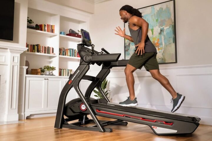 Man running on Bowflex Treadmill 10