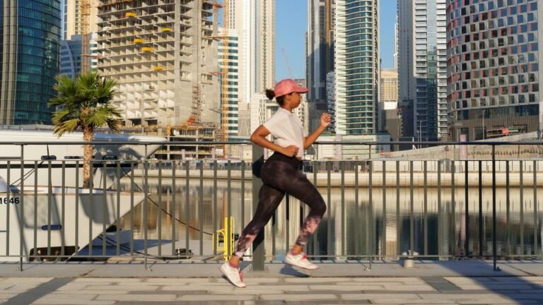 Woman running in city