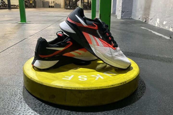 Reebok Nano X4 CrossFit shoes on a bumper plate